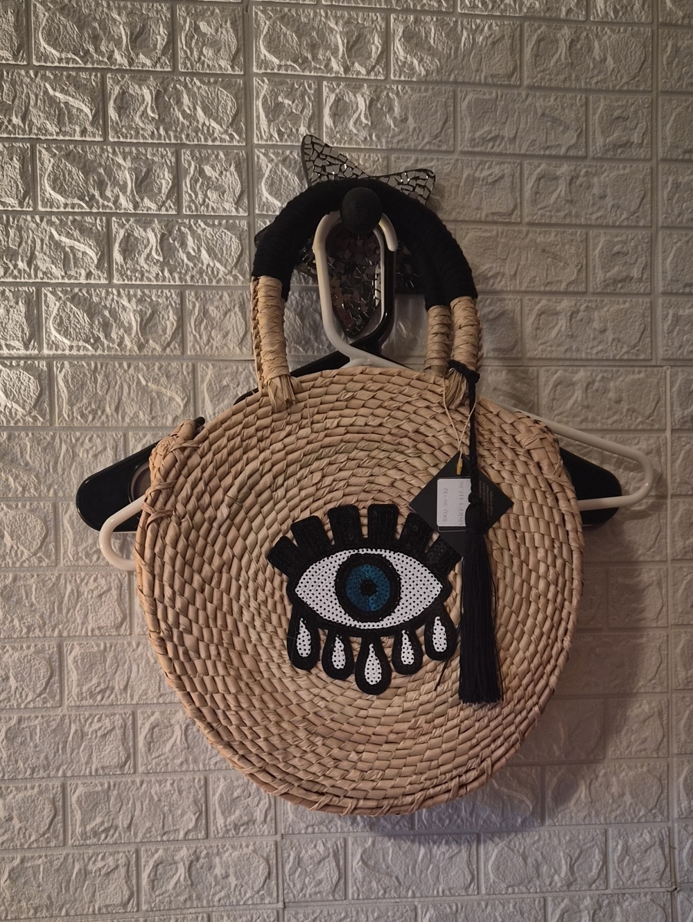 Woven Round Straw Tote with Embellished Eye Detail - Black & Natural
